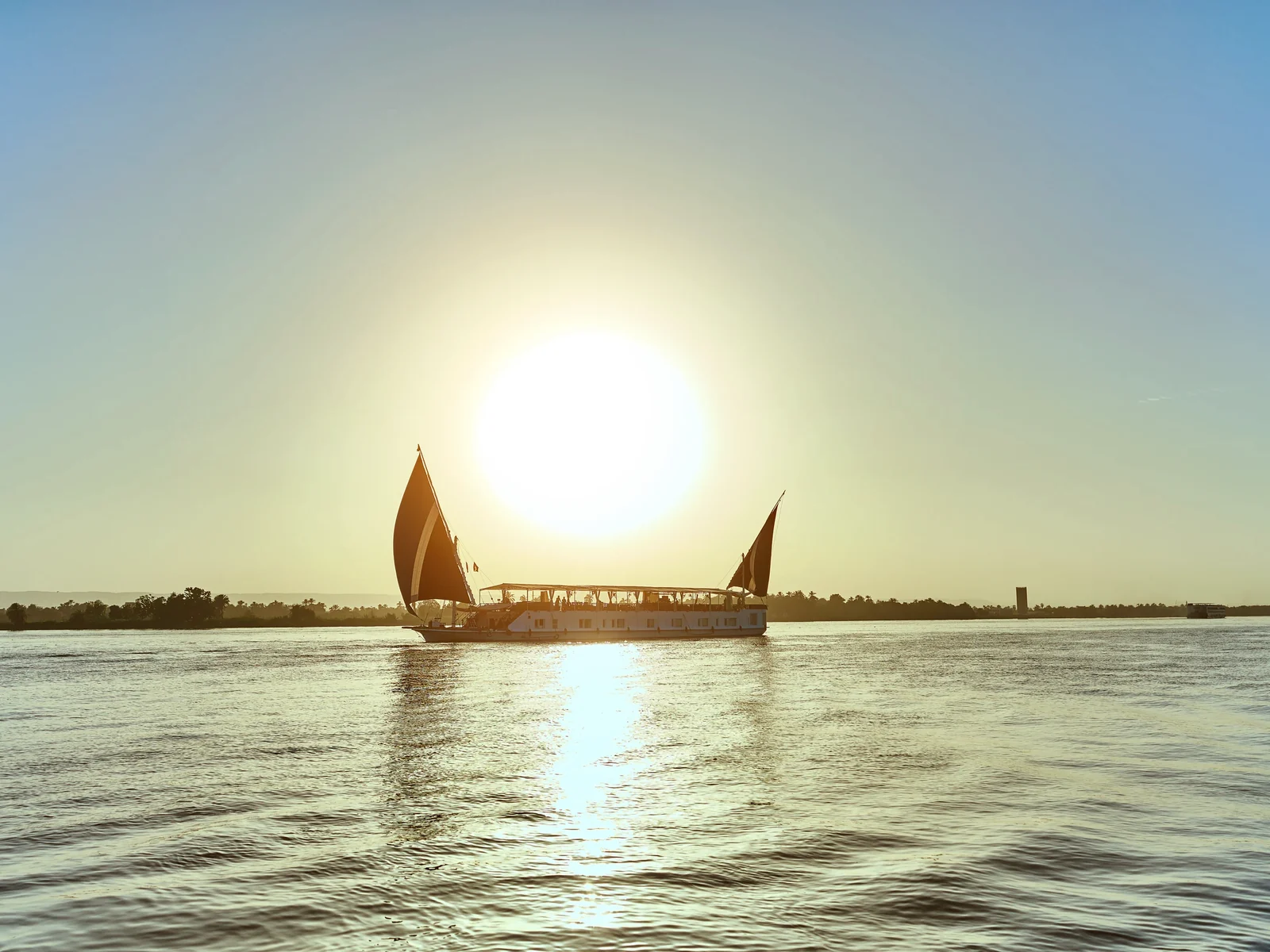 A sailing boat on the Nile at sunset
