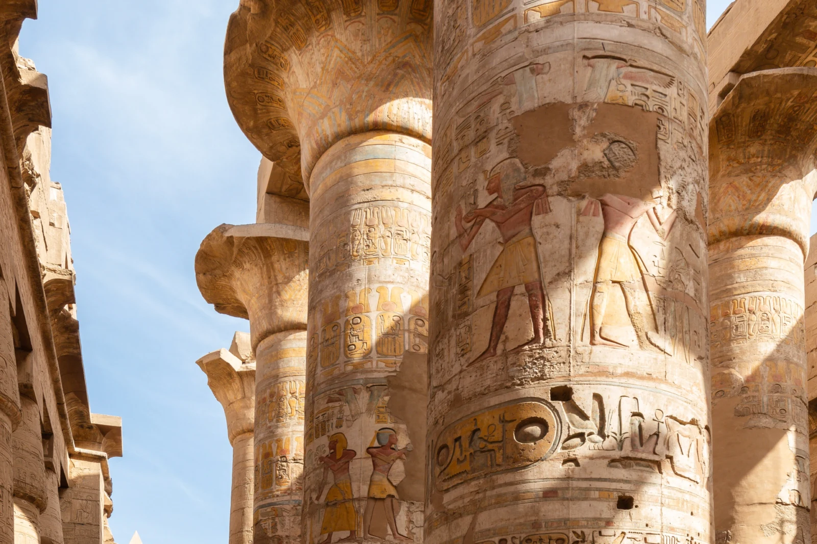 Ancient Egyptian statues and temple architecture at Karnak